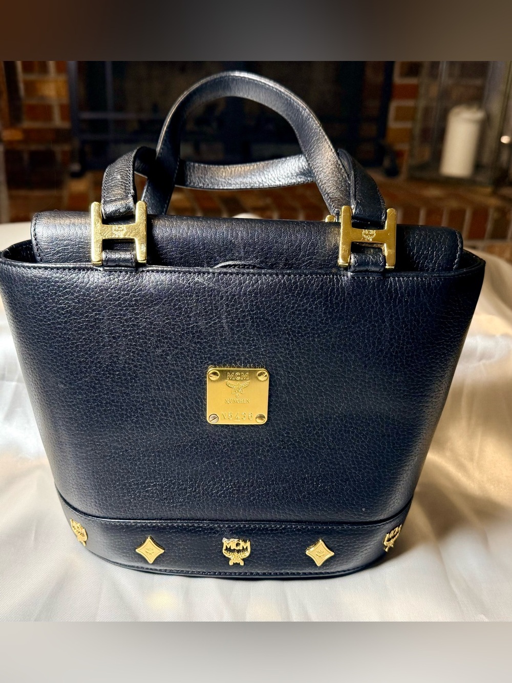 MCM Black Leather Flap with Gold Hardware Bucket Tote